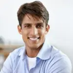 savvy businessman a handsome young smiling businessman
